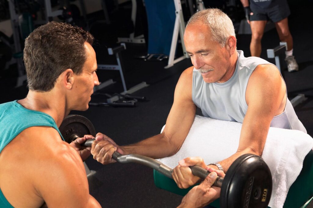 man lifting barbell