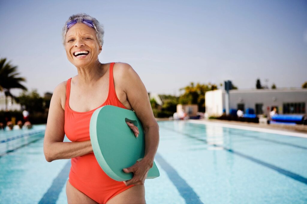 woman by swimming pool